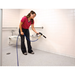 Advance All Cleaner XP spray gun washing a restroom stall