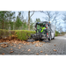 Karcher MC 250 sweeping leaves on a brick path