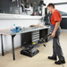 Karcher BR 40/10 C Adv scrubbing a workshop tile floor