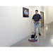 Advance Pacesetter 20SD scrubbing a hallway floor