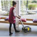 Karcher BD 30/4 C Bp scrubbing a floor by a window bench