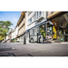 Karcher MC 150 sweeping a pedestrian shopping street
