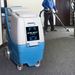 EDIC Galaxy Pro cleaning carpet with a Glidemaster wand