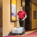 Advance Terra 28B sweeper in use on hotel hallway carpet