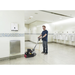 Advance FM810 XP scrubbing a restroom baseboard