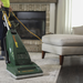 CleanMax CMP-3T vacuuming carpet in a living room