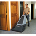 Advance CarpeTriever 28 vacuuming a carpeted hallway