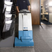 EDIC Polaris 12-gal cleaning carpet along a wall