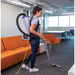 ProTeam GoFit 10 backpack vacuum in use by a lounge sofa