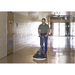 Advance Advolution 20 burnisher in use in a school hallway