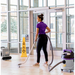 ProTeam ProGuard 10 wet/dry vacuum in use with wand in a lobby