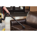ProTeam ProForce 1200XP on-board wand and dust brush on a sofa