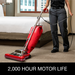 Sanitaire SC899H vacuuming a hotel guest room