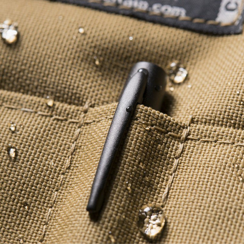 All-weather pen peaking out of the cover's pen pocket.