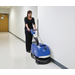 Clarke Vantage 14 scrubbing an office hallway floor