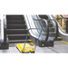Cimex X-46 escalator cleaner in use at the foot of an escalator