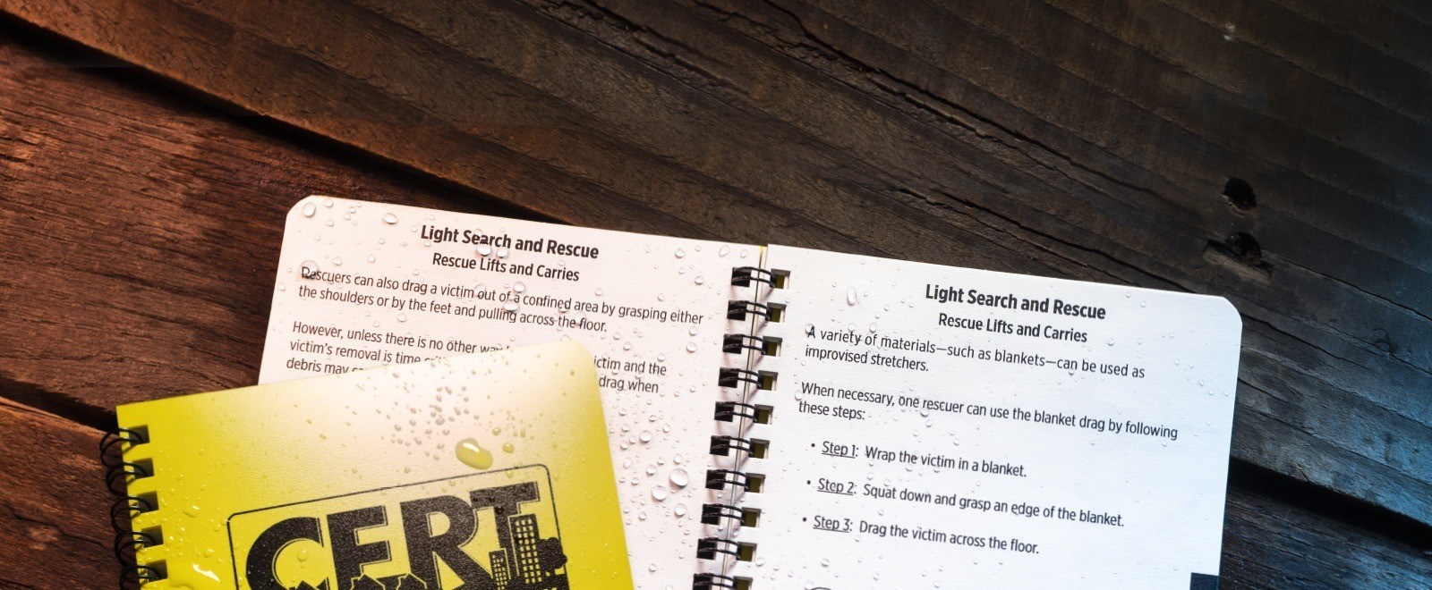 Cert Guide open with water drops covering the page.