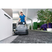 Karcher CVS 65/1 Bp sweeping office carpet along a cabinet